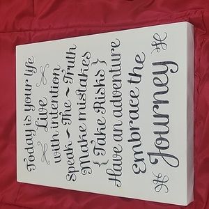 Motivational wall hanging.
